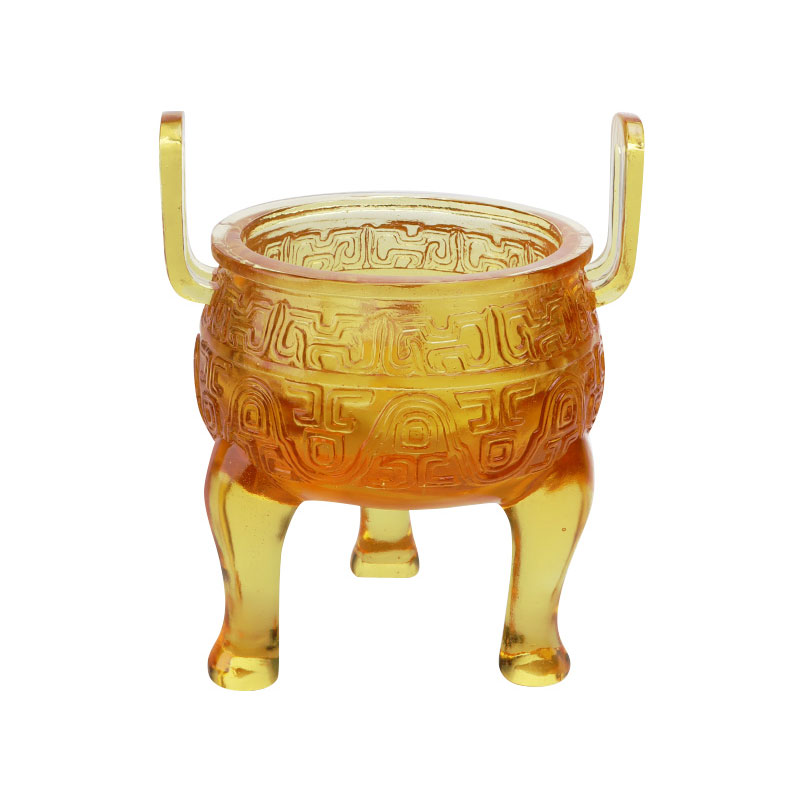 Goudkleurige glazuur statiefornamenten